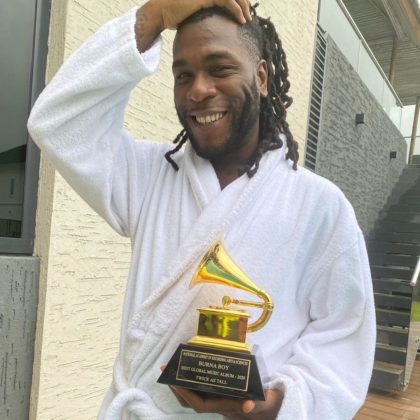 Burna Boy Takes Possession of Grammy Plaque | WATCH