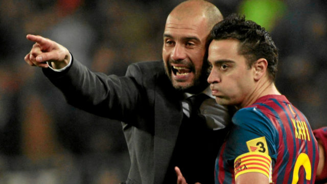 Guardiola and Xavi