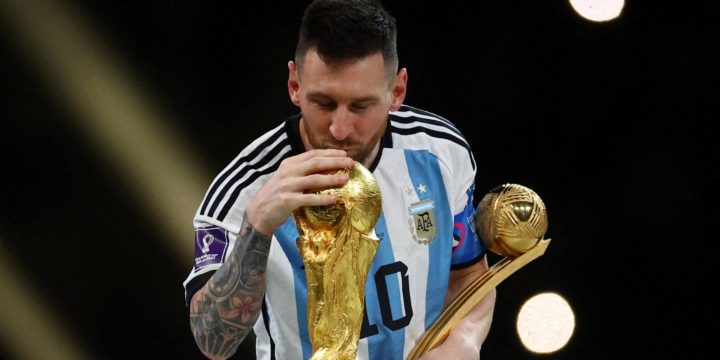 Argentina's Lionel Messi kisses the World Cup trophy 