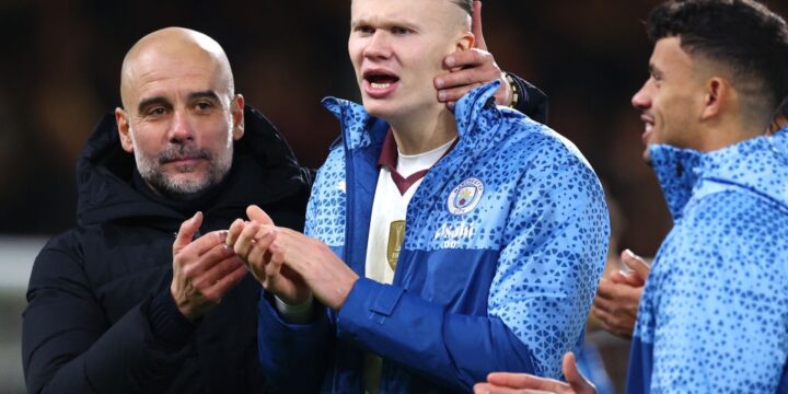 Pep Guardiola and Erling Haaland