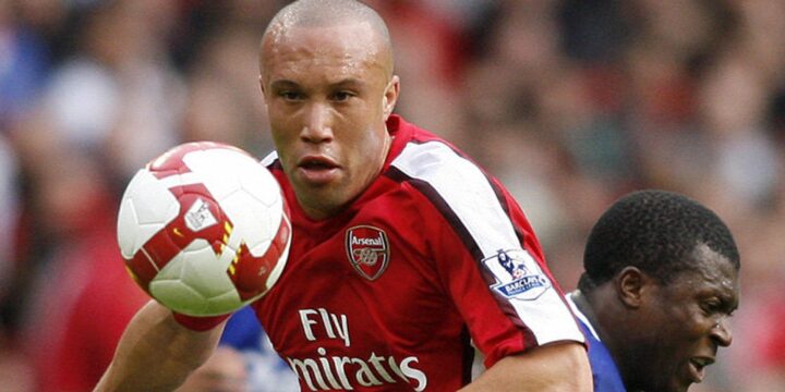 Mikael Silvestre in Arsenal's red and white jersey after his move from Man United