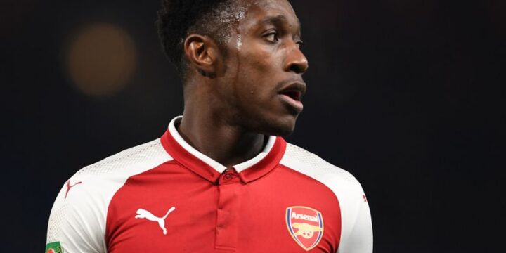 Danny Welbeck in Arsenal's red and white jersey after his move from Manchester United