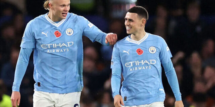 Erling Haaland and Phil Foden in the Man City sky blue and white jersey after a game for the club
