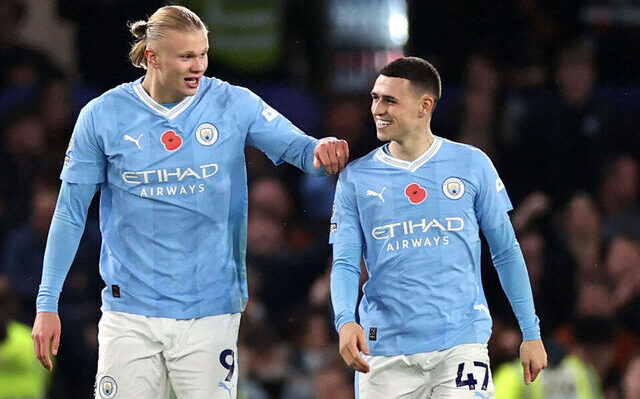 Erling Haaland and Phil Foden in the Man City sky blue and white jersey after a game for the club