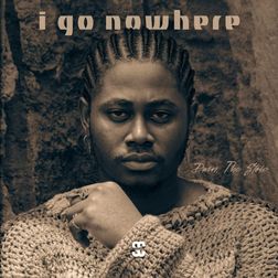The cover art for "I Go Nowhere" by Dwin The Stoic features a sepia-toned image of the artist. Dwin The Stoic is gazing directly at the camera with a serious expression. He is wearing a chunky knit sweater and has his hair styled in neat braids. The background appears to be a textured, rustic wall that complements the earthy tones of the image. The title "i go nowhere" is written in bold, block letters at the top, with the artist's name "Dwin The Stoic" in a smaller, cursive font to the right. The overall mood of the cover is introspective and grounded.
