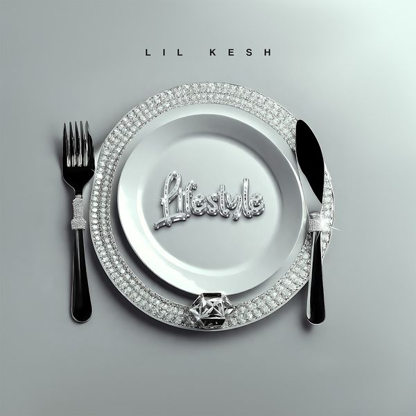 The image is the cover art for the song "Lifestyle" by Lil Kesh. It features a minimalist design with a silver dinner plate adorned with a diamond-encrusted border, accompanied by a matching fork and knife. The word "Lifestyle" is elegantly scripted in the center of the plate in a shiny, metallic font. The artist's name, "Lil Kesh," is displayed at the top of the image in simple, black text. The overall aesthetic is sleek and luxurious, reflecting the theme of the song.