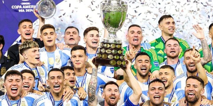 Argentina lifting the 2024 Copa America trophy