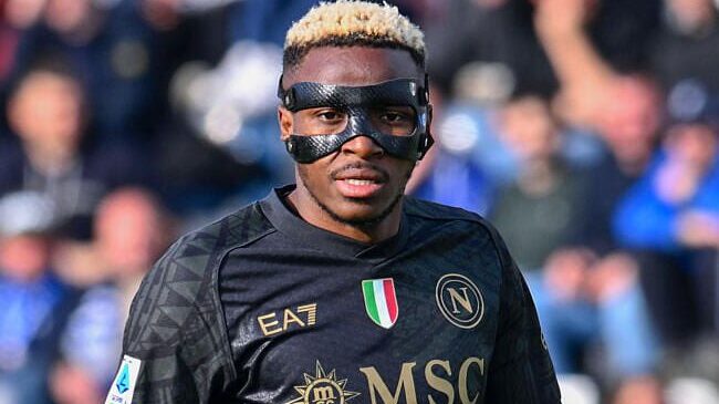 Victor Osimhen wearing Napoli's black away jersey