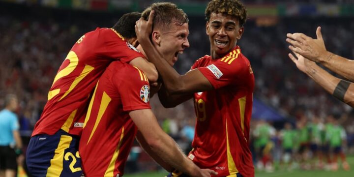 Dani Olmo celebrating hi9s goal for Spain at the Euros 2024 with his team mates